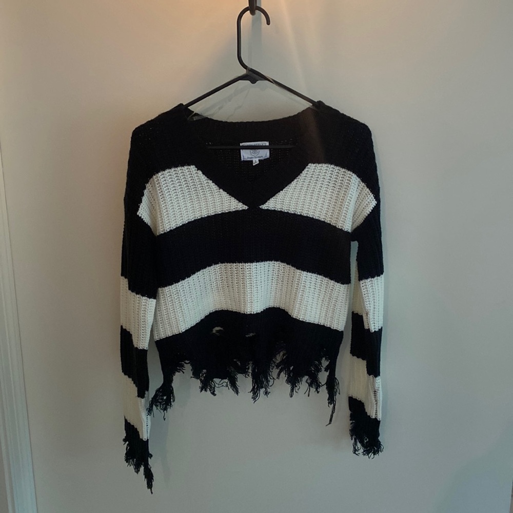 Lightly used sweater, black and white, size small